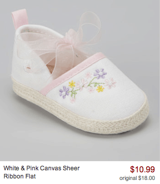 white pink canvas shoe