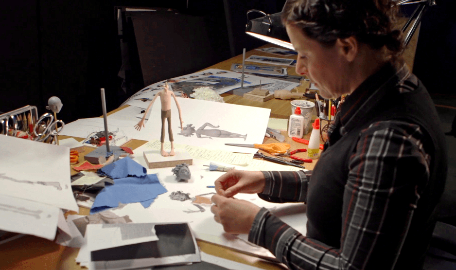 Costume Designer Deborah Cook works on one of Egg’s outfits during production of LAIKA and Focus Features' family event movie THE BOXTROLLS, opening nationwide September 26th. Credit: LAIKA, Inc.