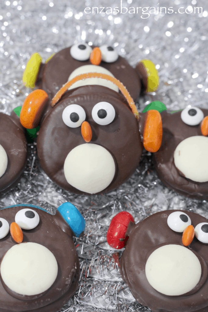 Adorable Penguin Oreo Cookies with Ear Muffs Recipe! Kids will love these popular cookies! Find out the yummy ingredients!